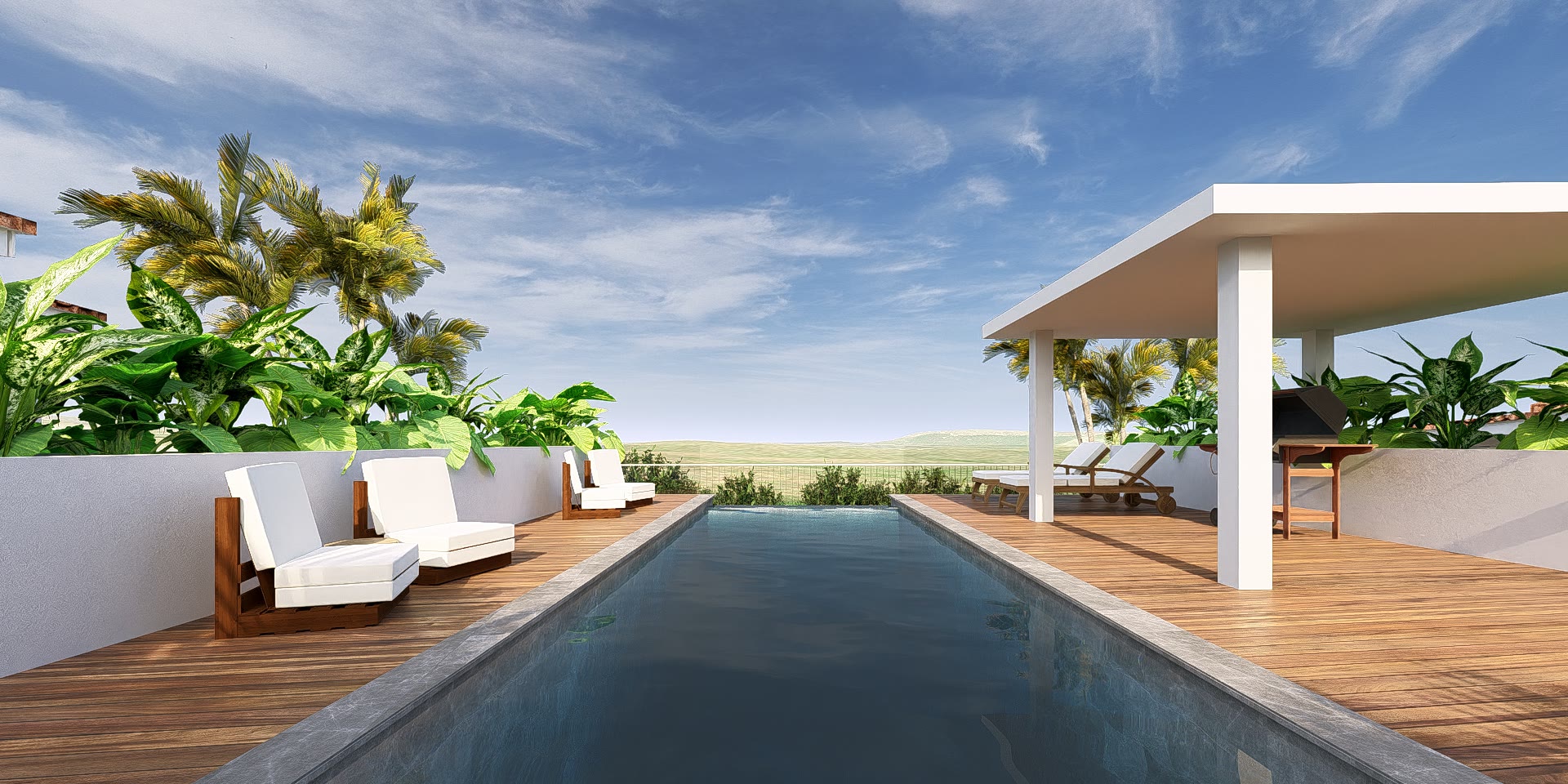 Het gezamenlijke zwembad van Cas Abou Resort, over de lengte gezien richting het paviljoen