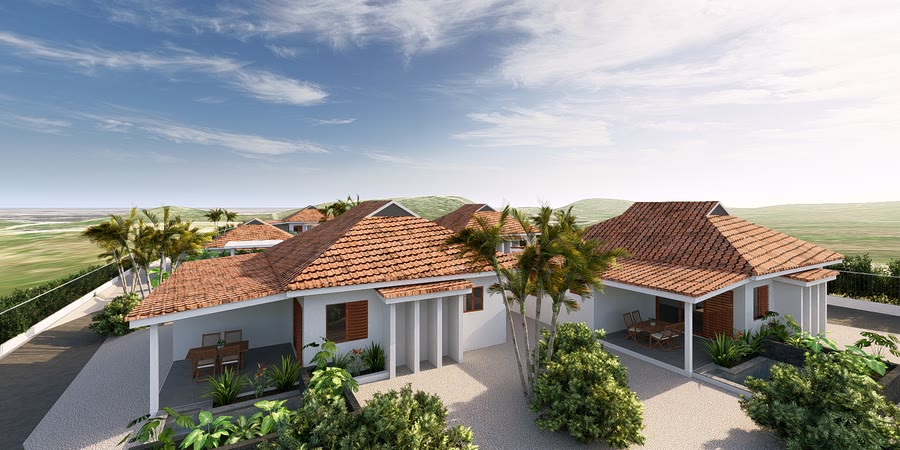 Twee villa's naast elkaar met palmen ertussen